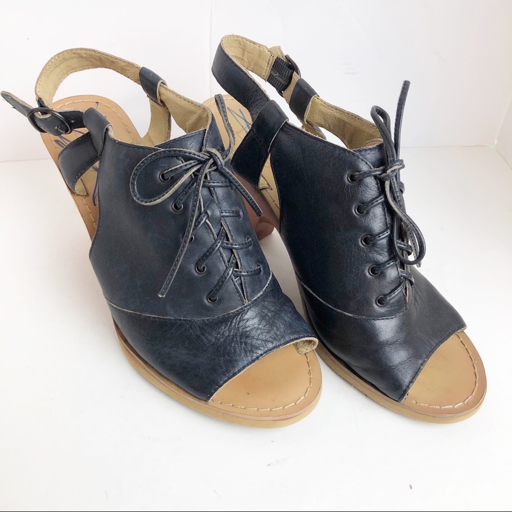 Anthro Latigo trellis navy leather lace up wedge